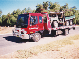 A heavy truck being towed