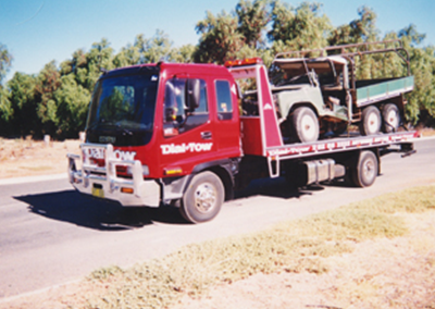 A heavy truck being towed