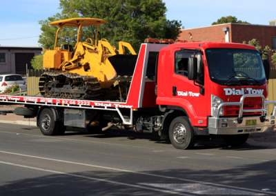 Front loader being towed