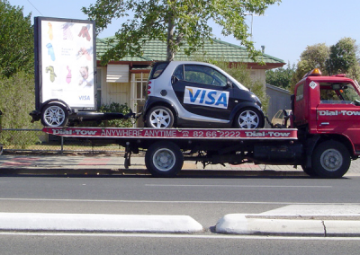 Car and trailer signage being towed simultaneously