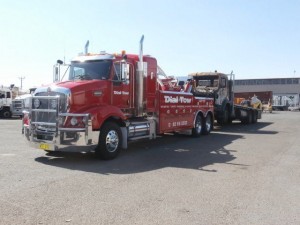 Heavy Truck Towing with one of our fleet's 12 ton heavy tilt tow trucks