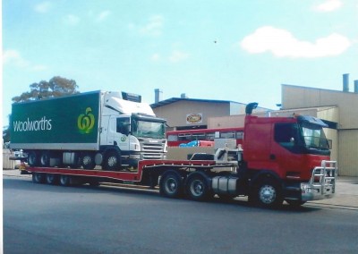 Dial-a-Tow towing a Woolworths transport truck broken down on the highway
