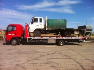 A truck being towed in one of our heavy vehicle tow trucks